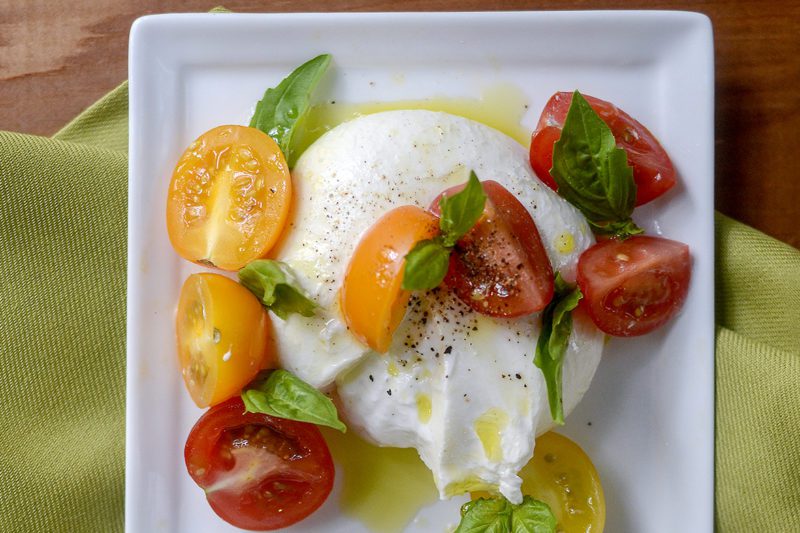 Mozzarella with fresh tomatoes and basil for healthy meals